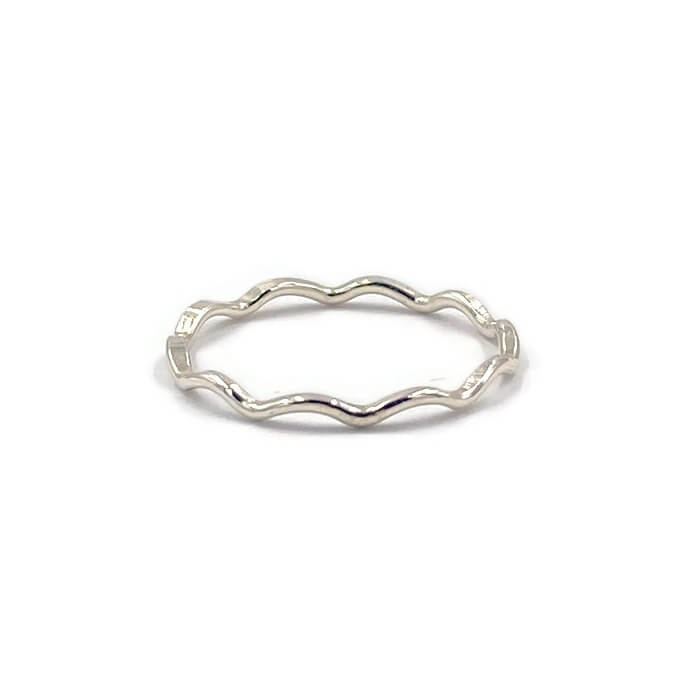 This is a dainty sterling silver wave ring that is stackable. 