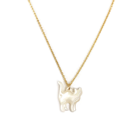 This is a white cat necklace that is made of mother of pearl on a 14k gold chain. 