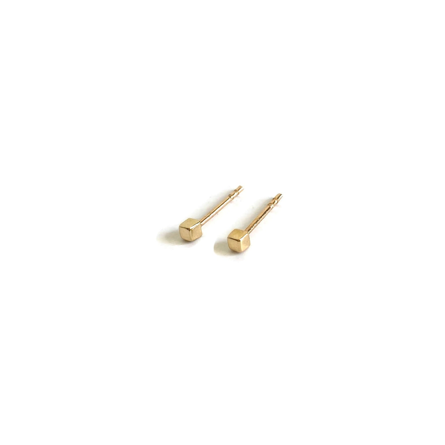 14k cube stud earrings are made of solid 14k gold and 14k ear posts