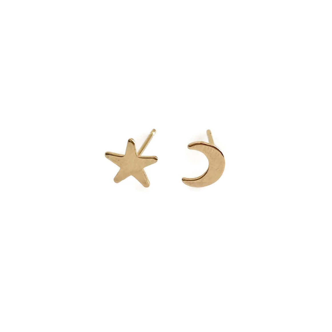 This mismatched moon and star stud earrings are made of solid 14k gold. The moon is a crescent moon shape mismatches with the single star stud.  The two make it a fun pair of gold stud earrings. 