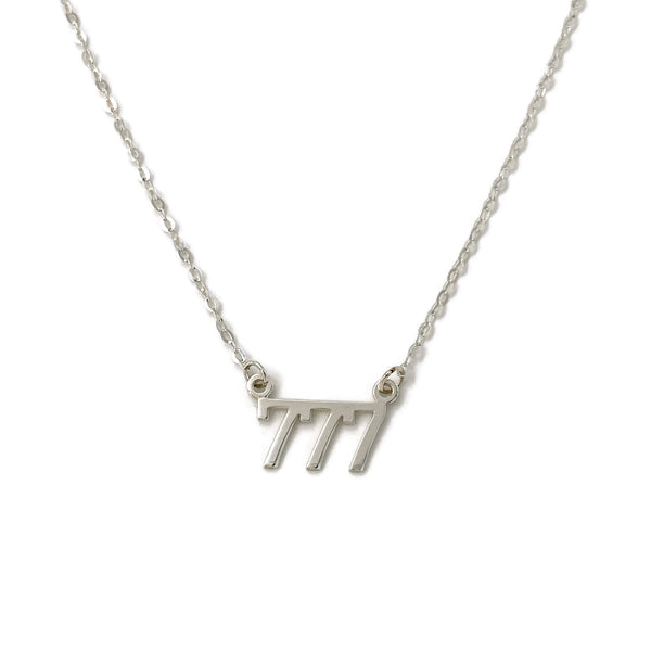 This is a silver 777 Angel number necklace that is made of sterling silver 777 charm and dainty sterling silver chain. 