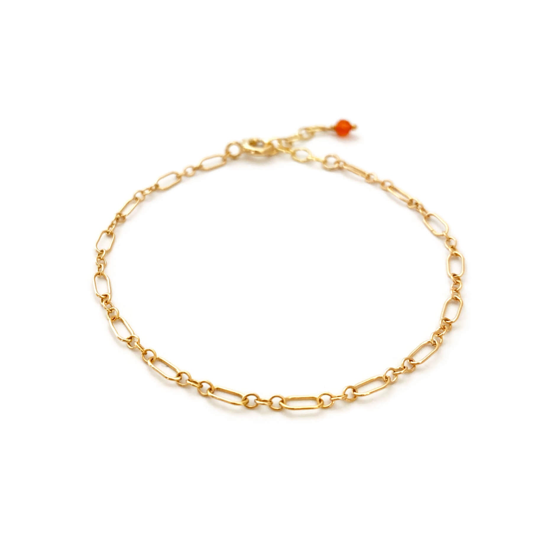 This is a dainty gold figaro chain with carnelian bead.  It's made of gold filled figaro chain with genuine carnelian bead. 