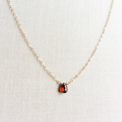 This dainty garnet necklace is made of real garnet and 14k gold chain.  This garnet birthstone necklace can also be made in sterling silver or gold filled chain.