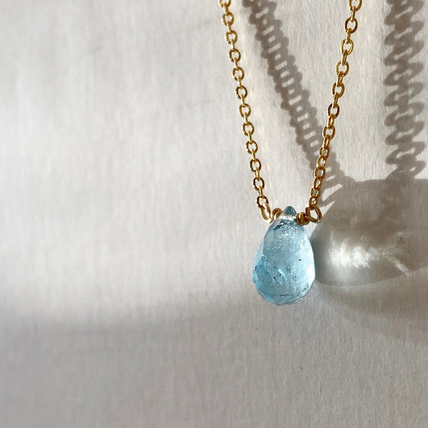 This aquamarine necklace is made of 14k gold or gold filled chain in 16 inches or 18 inches long.