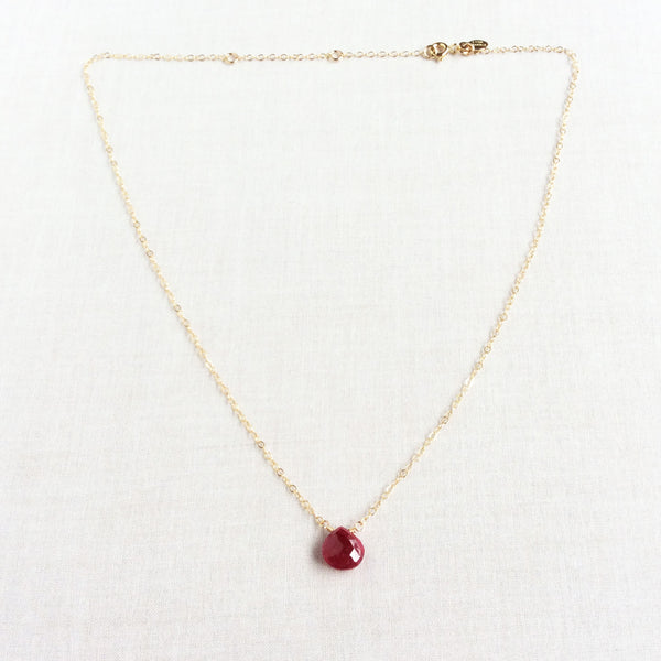 This ruby necklace is made of gold chain and real red ruby. The necklace is in gold and adjustable. 