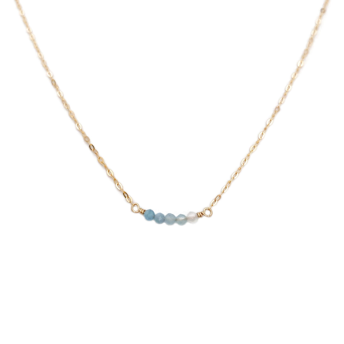This ombre blue necklace is made of genuine shaded aquamarine beads and 14k gold chain.  It can be made in gold filled chain or sterling silver chain with extender. 