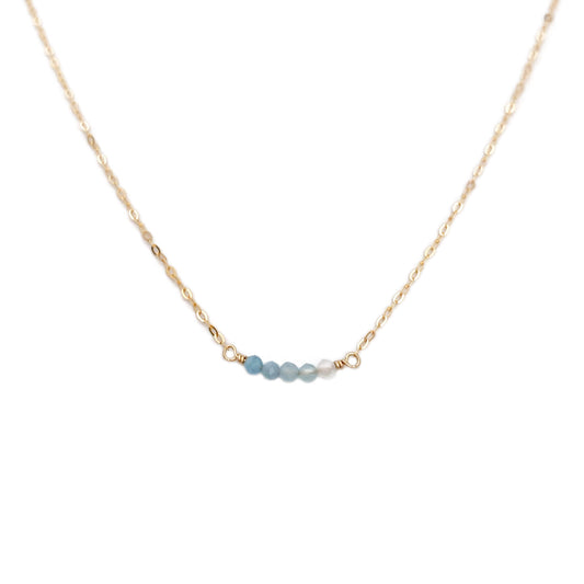 This ombre blue necklace is made of genuine shaded aquamarine beads and 14k gold chain.  It can be made in gold filled chain or sterling silver chain with extender. 