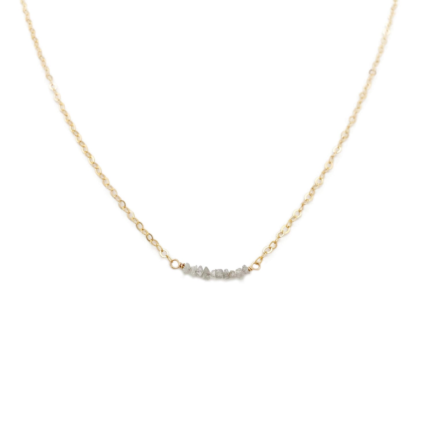 The dainty diamond bead necklace is made with hand selected raw diamonds and 14k gold chain.  We can also custom make it in sterling silver or gold filled chain.