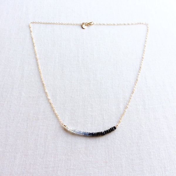 This sapphire bead necklace is unique and simple.  It's create with shaded real blue sapphire beads.  It's simple and elegant.