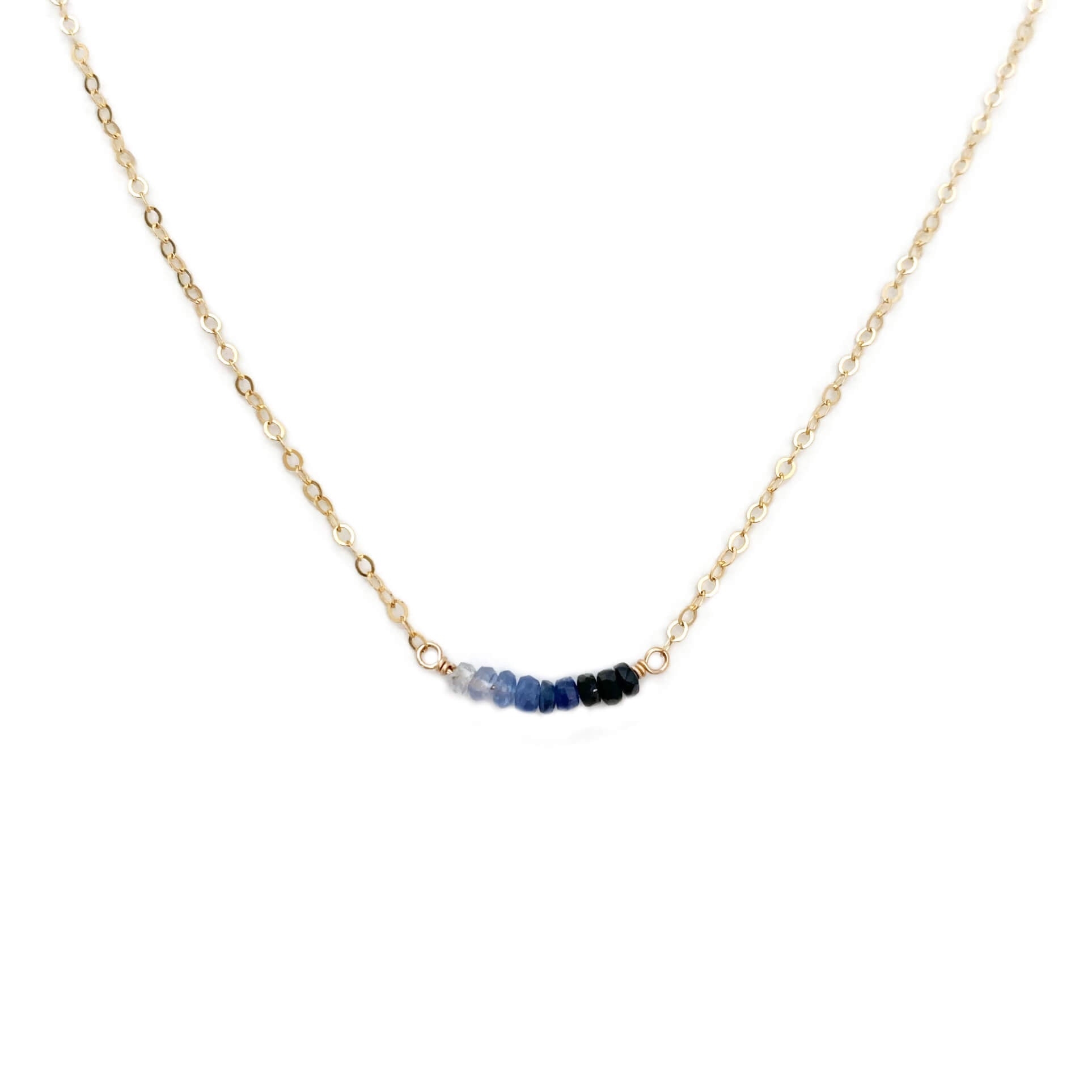 This dainty sapphire necklace is made of genuine sapphire beads and 14k gold chain.  We can make it in sterling silver or gold filled chain with extender. 