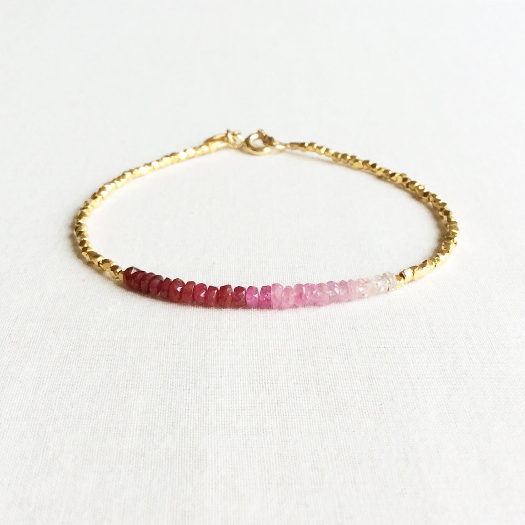 The ombre ruby bracelet is made with hand-selected rubies that have different shades of red – from nearly white to the deepest red. 