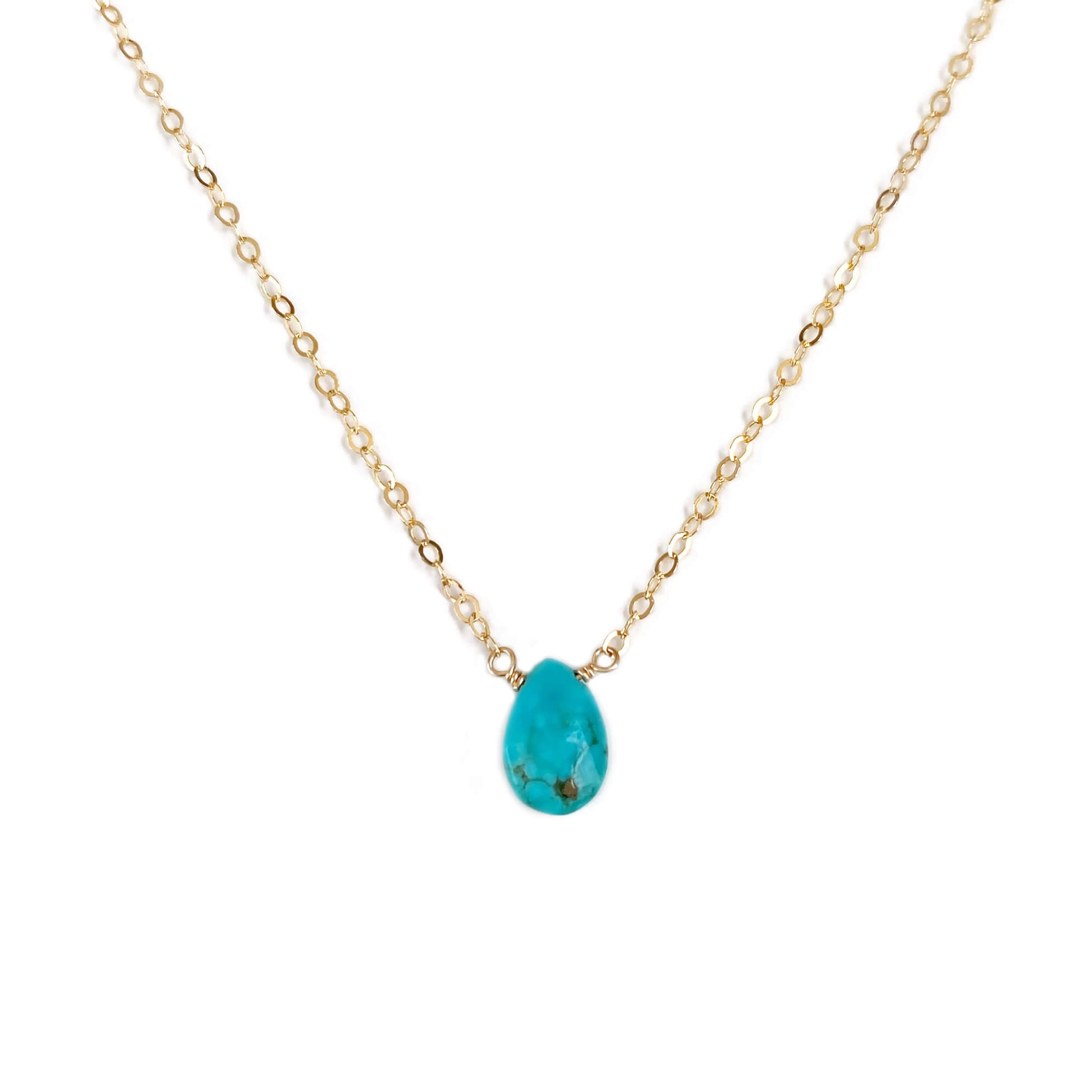 This dainty turquoise necklace is cute and simple.  It's made of a single real turquoise bead and 14k dainty gold chain.  The turquoise stone color is bright blue with some pyrite inclusion in it. Each gemstone is unique and no two are the same. 