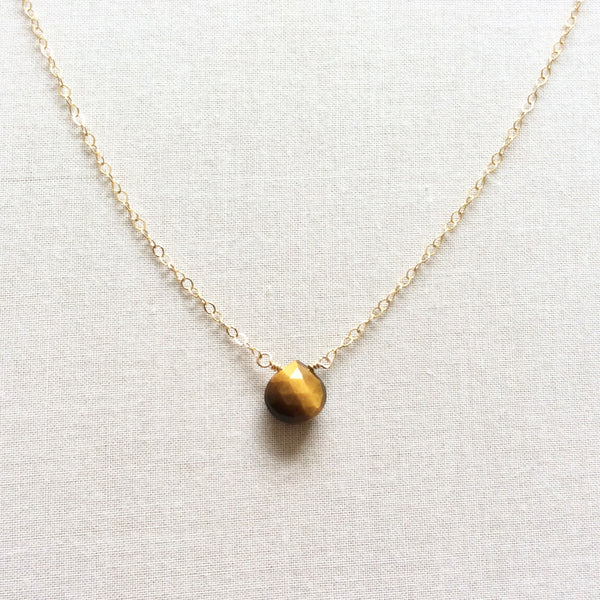 The tiger eye stone necklace meaning is believed to help with harmony and balance