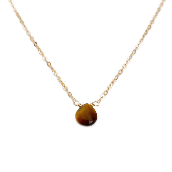 Dainty tiger eye necklace is made with a single tiger eye gemstone. 