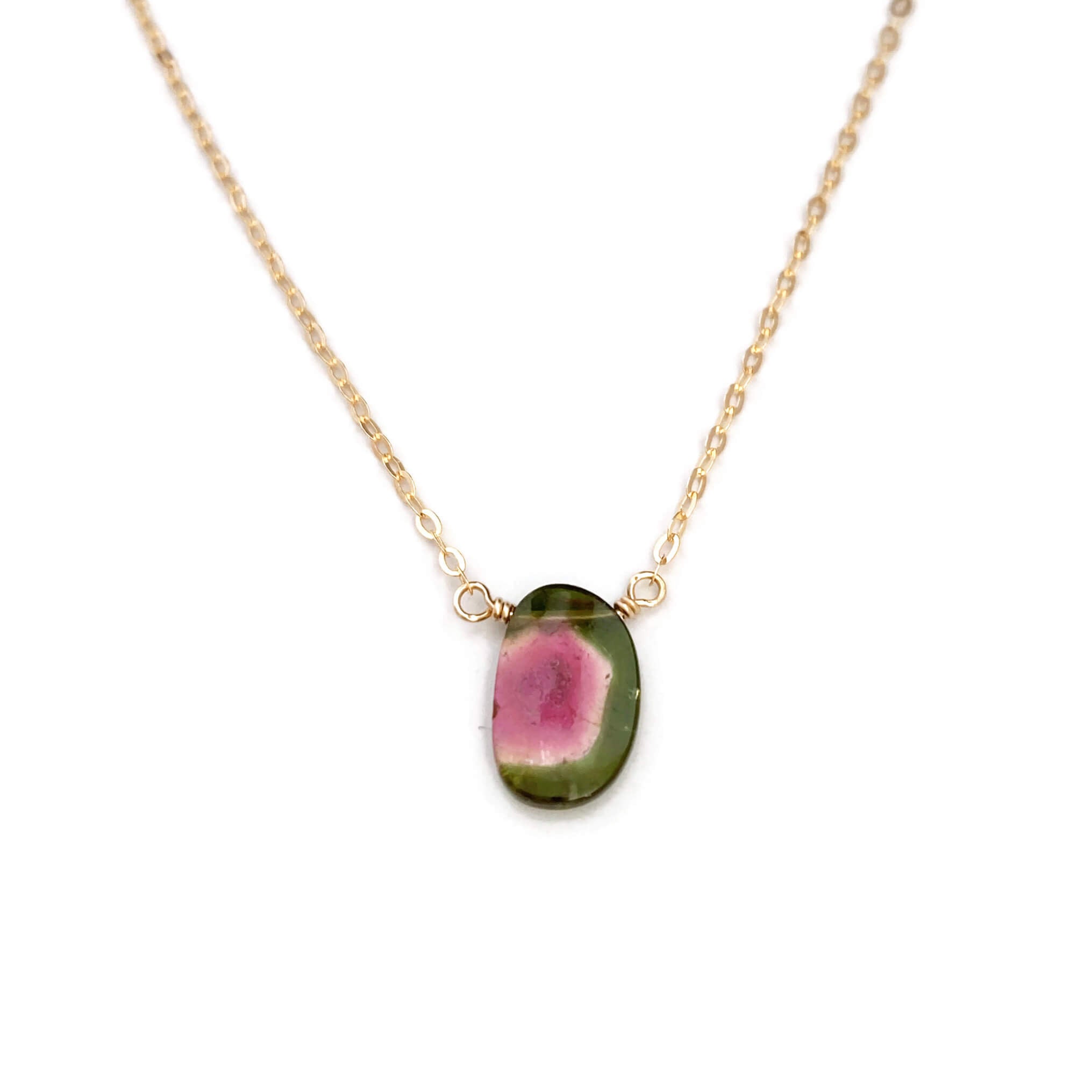This watermelon tourmaline slice necklace is handmade in our San Francisco studio with careful craftsmanship. Perfect for that casual fun look, the chain for this necklace can be made in several different materials. 