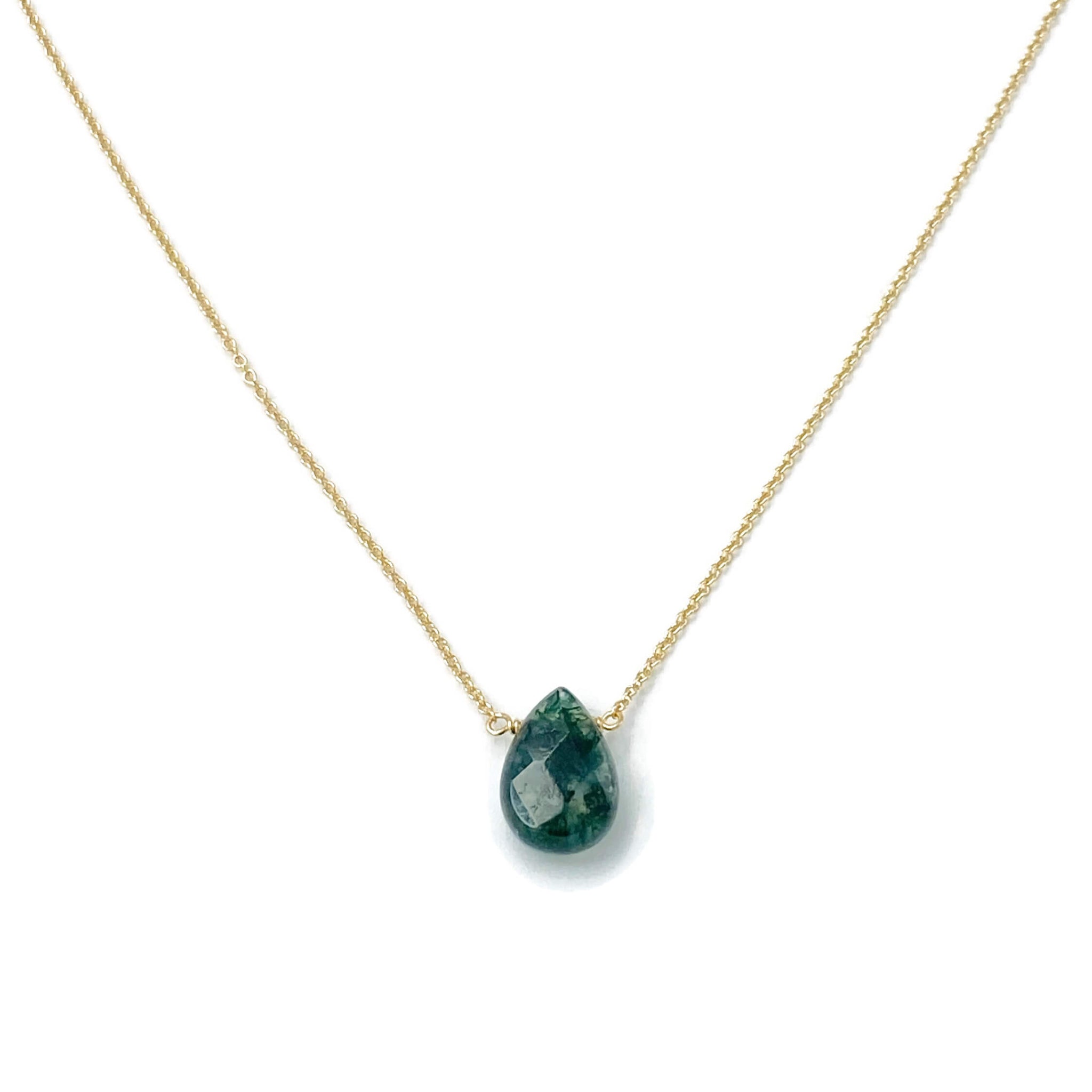 This green moss necklace is made with a single green moss agate gemstone. The stone is named for its earthy greenish color and although ‘moss’ is in the name, the stone actually comes from the ancient volcanoes.