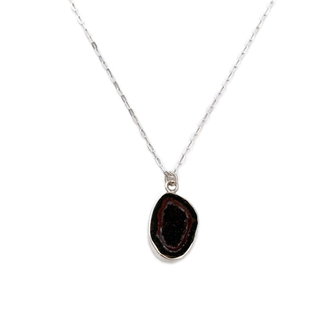 This geode necklace is a fun but elegant accessory. It's made of 18 inches sterling silver chain with real geode. 