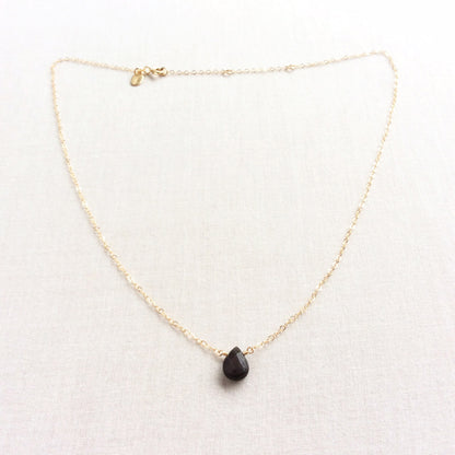 This simple but sophisticated dainty obsidian necklace is made with a single black obsidian gemstone. 