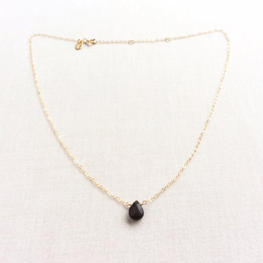 This simple but sophisticated dainty obsidian necklace is made with a single black obsidian gemstone. 