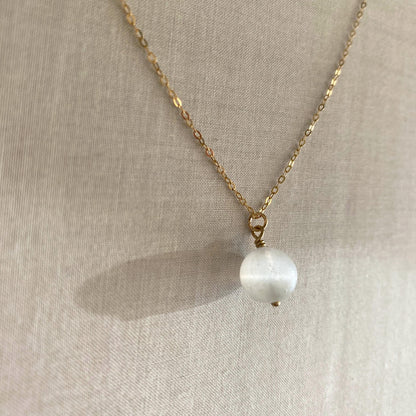 This selenite necklace is made of selenite crystal with gold chain.  Selenite works as a vacuum cleaner to cleanse the aura and energy.