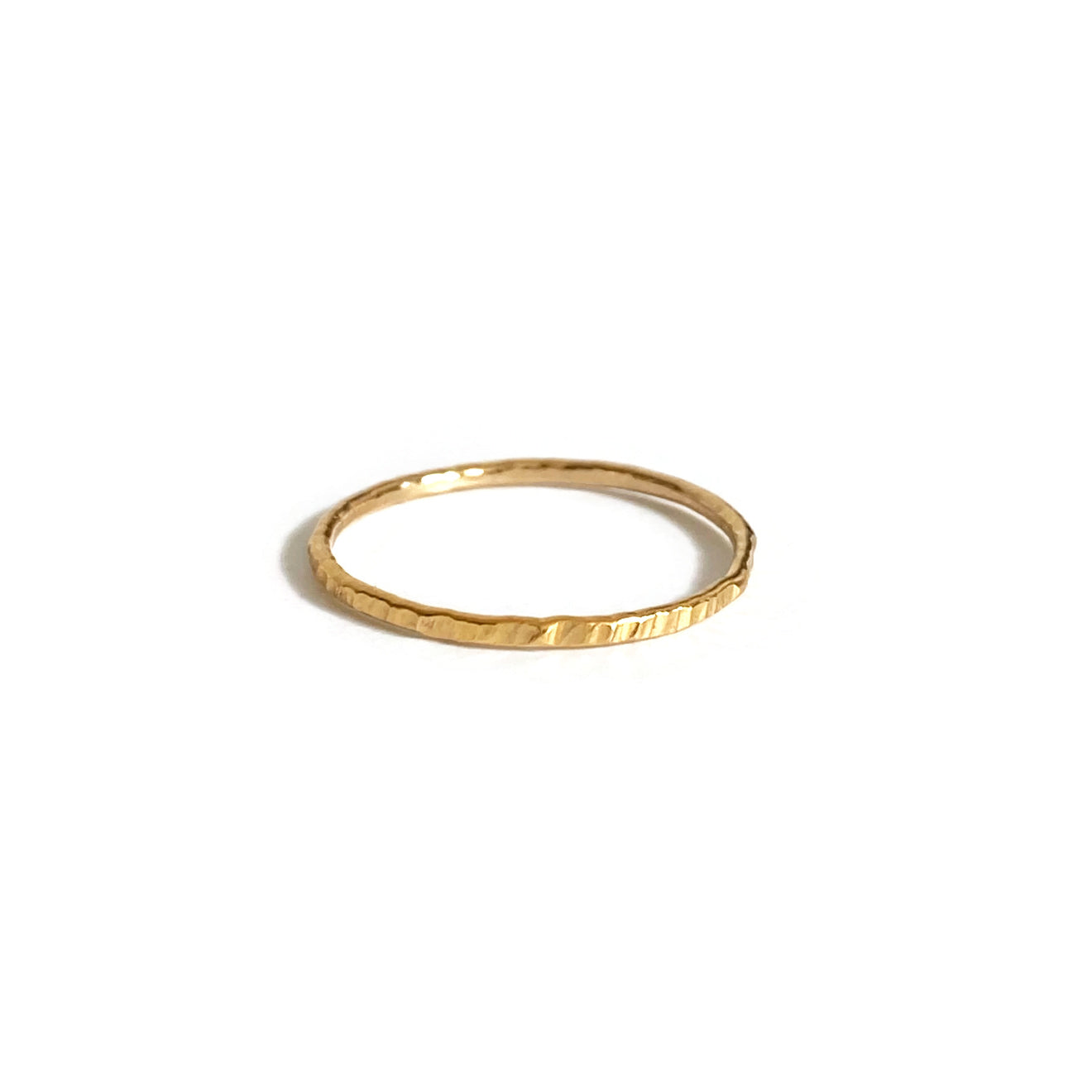 This is a thin hammer texture ring that is made of gold filled wire with hammered texture. 