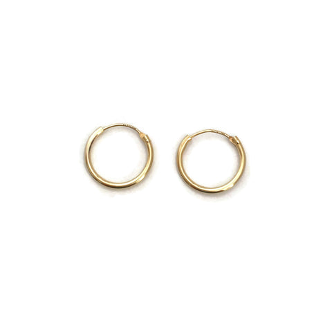 These are 14k solid gold hoop earrings. They are as light as feather and great to wear them 24/7