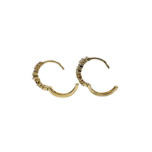 This is the side view to show you what it looks like when these 14k gold hoops open. 