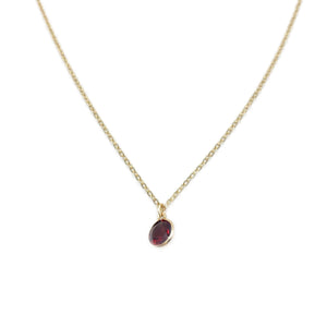 This is a 14k garnet necklace that is made of 14k bezel set garnet with 14k gold chain.