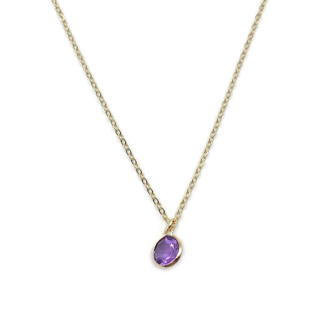 This is a 14k amethyst necklace that is made of 14k bezel set Diamond cut Amethyst with 14k gold chain