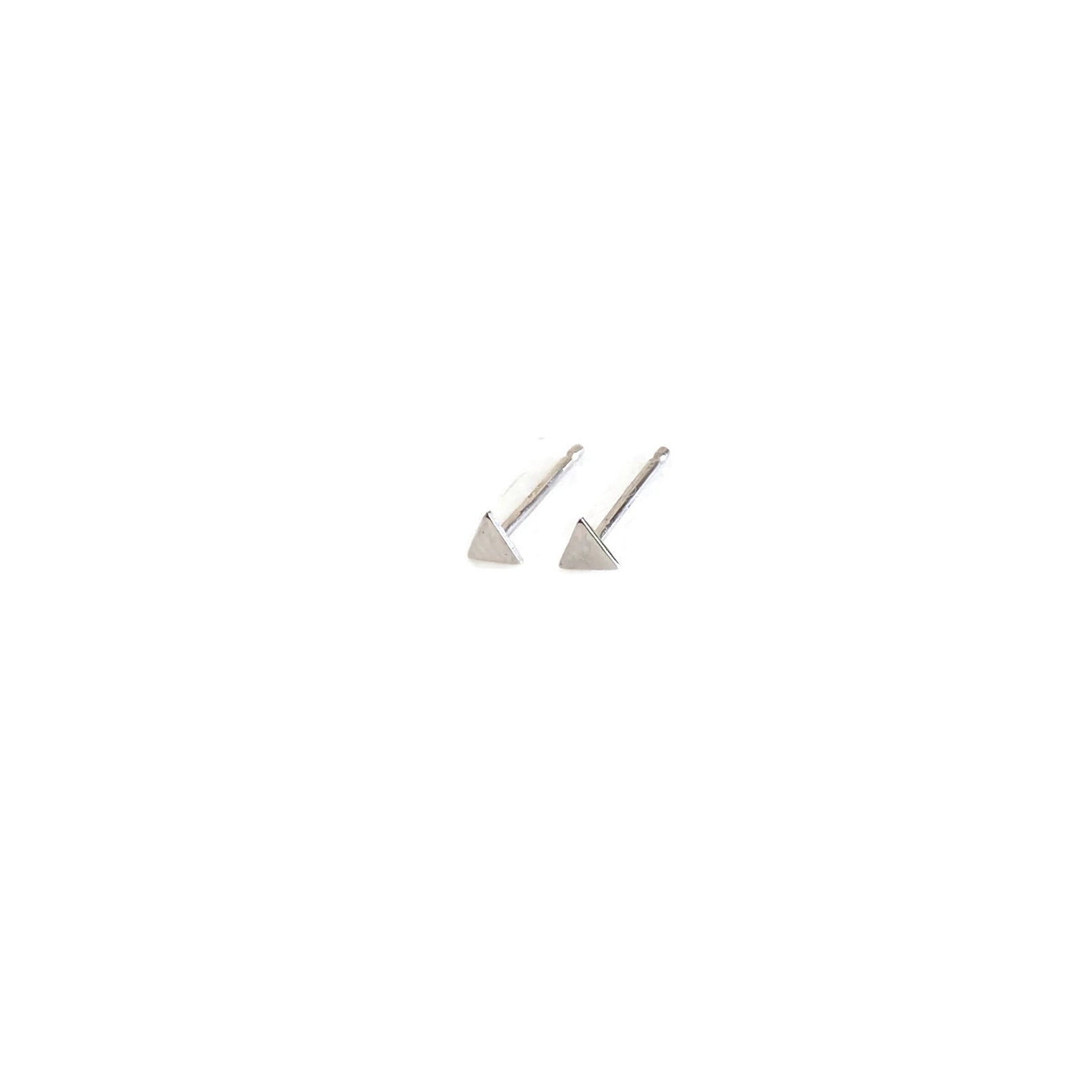 sterling silver tiny triangle studs are great for ear lobe or cartilage piercing.